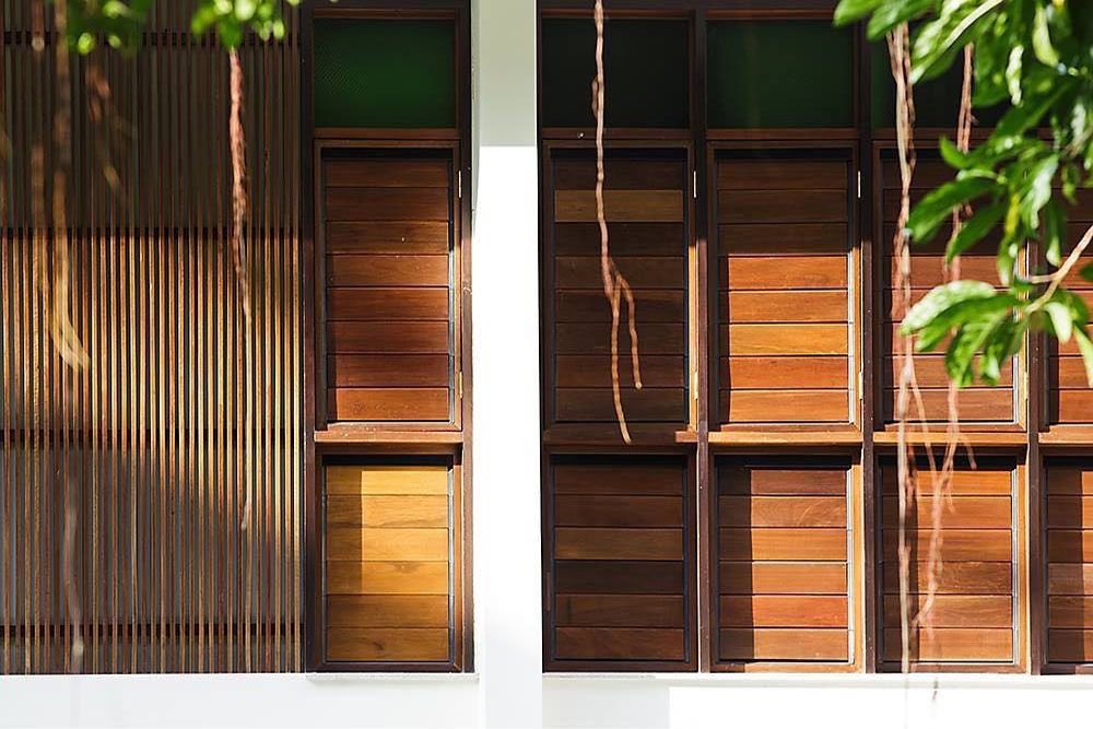 Close up of Breezway louvres with timber blades from the outside